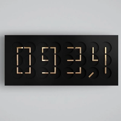 Die ClockClock 24 zeigt die Uhrzeit mit 24 schwarzen Korpus mit 22 Karat vergoldeten Uhrzeigern sich synchron bewegen. Aus den Zeigern formt sich eine digitale Anzeige. Das minimalistische Design wirkt modern, technisch und zugleich k&uuml;nstlerisch pr&auml;zise