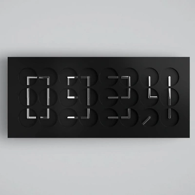Die ClockClock 24 zeigt die Uhrzeit mit 24 schwarzen Korpus mit beschichteten Uhrzeigern sich synchron bewegen. Aus den Zeigern formt sich eine digitale Anzeige. Das minimalistische Design wirkt modern, technisch und zugleich k&uuml;nstlerisch pr&auml;zise